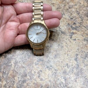Women’s Citizen 10.5” around, gold slide bracelet watch
